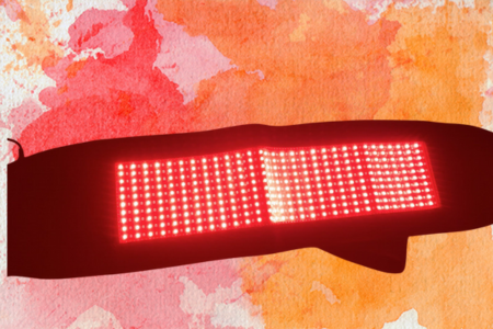 a red light on a colorful background